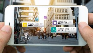 Entrepreneur managing Facebook Ads campaign on laptop to increase brand visibility and drive business growth