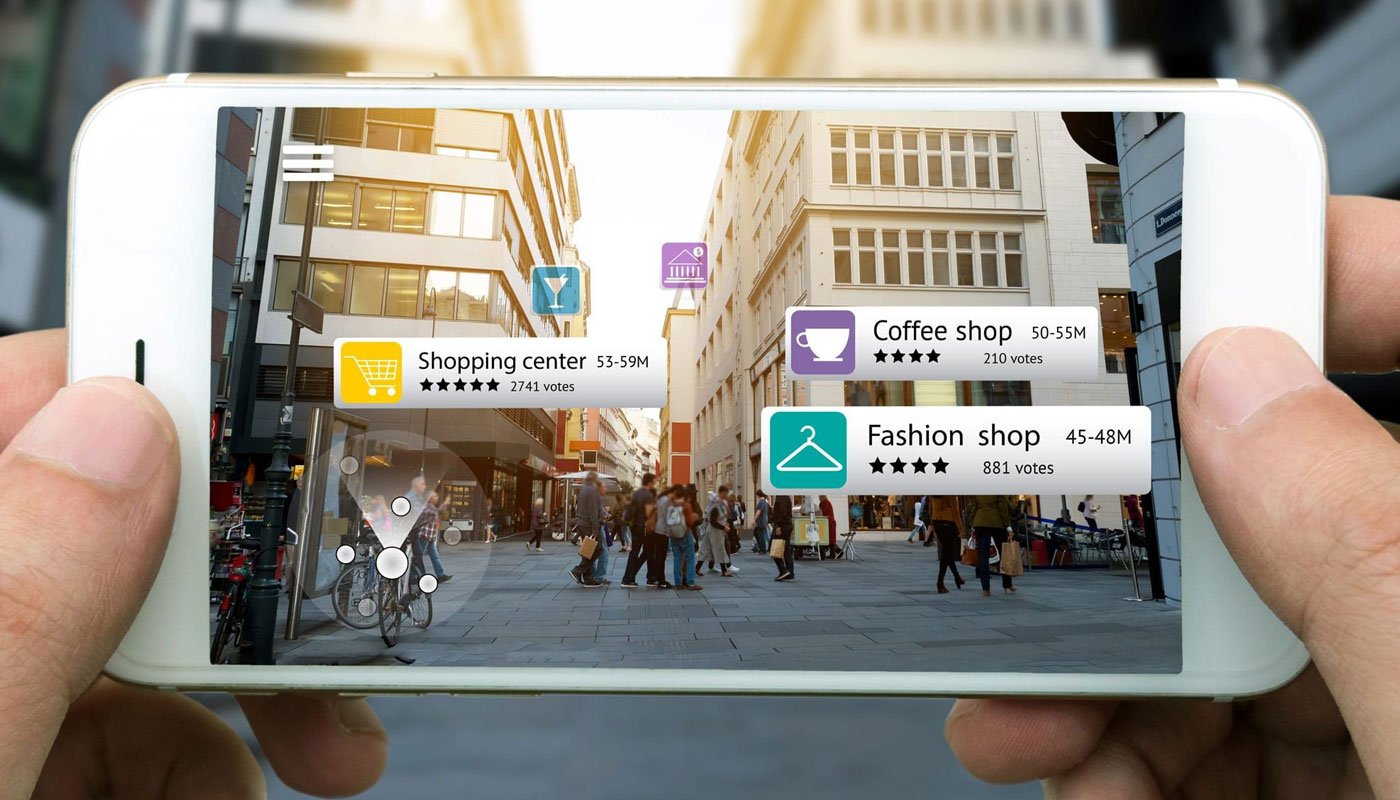 Entrepreneur managing Facebook Ads campaign on laptop to increase brand visibility and drive business growth